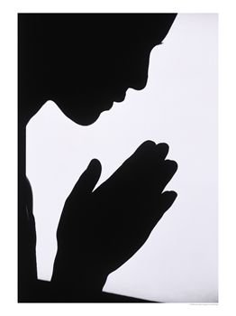 silhouette-of-woman-praying-photographic-print-c11964946